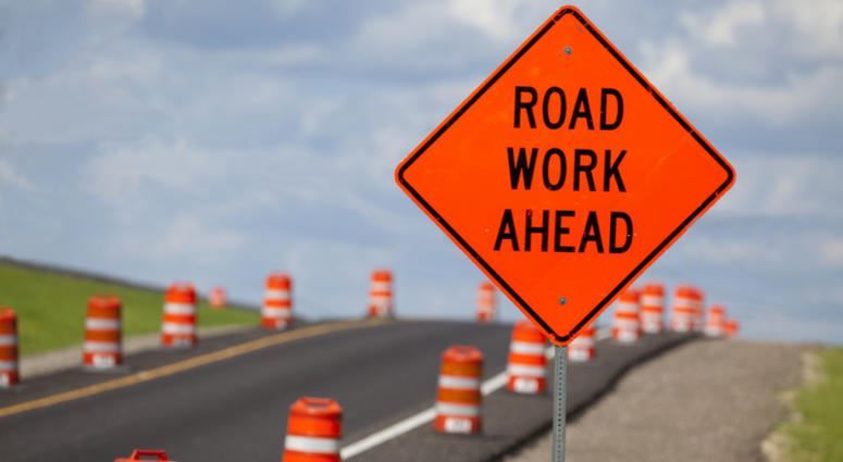 orange road work sign